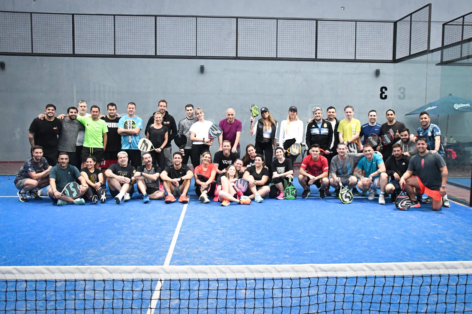 Academia Frontini players together on a padel court